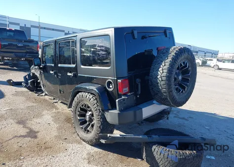 2015 Jeep Wrangler Unlimited Sahara z USA, uszkodzony, nr VIN 1C4BJWEG9FL530151